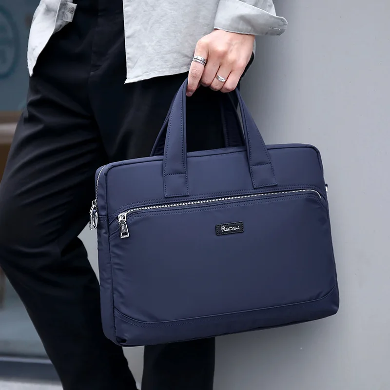 กระเป๋าเอกสารผู้ชายสุดหรูอเนกประสงค์ ทำจากไนลอน กระเป๋าทำงานเรียบง่าย ความจุขนาดใหญ่ สะพายไหล่เดียว ใช้เป็นกระเป๋าถือสำหรับนักธุรกิจหรือกระเป๋าสะพายข้าง