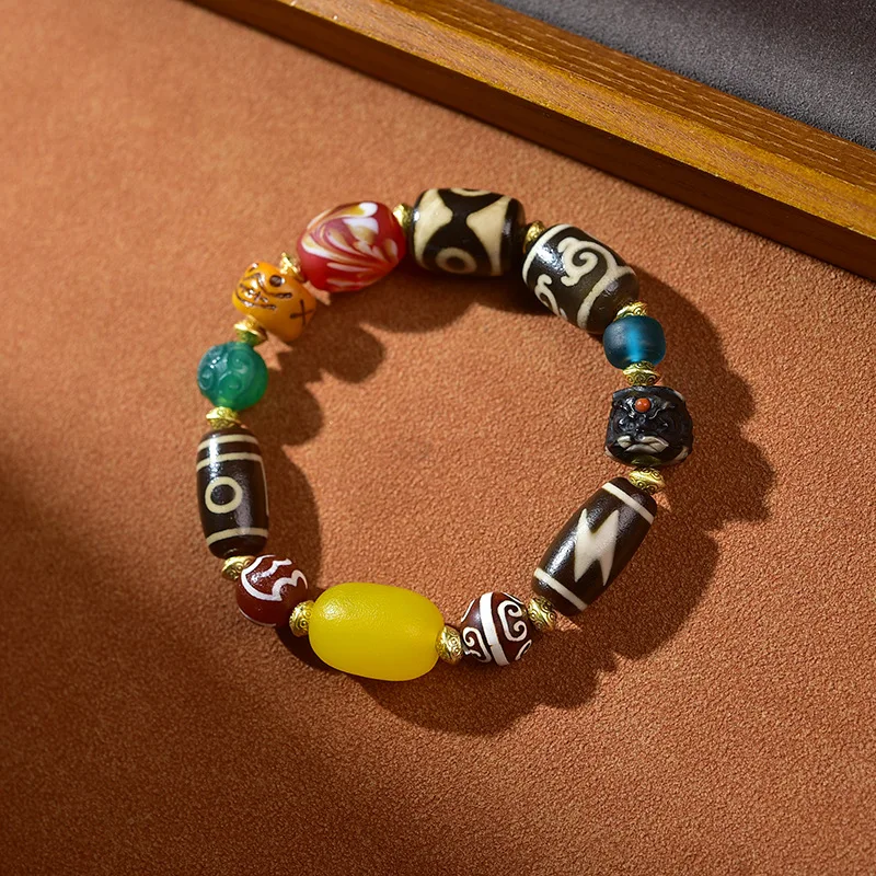 Tibetan-style multi-bead bracelet three- paired with Tara and five-eyed beads,