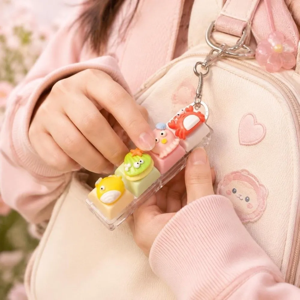 Cartoon 4-Key Marine Animals Keychain Squeezable Ocean-themed Dolphin Keychain Funny Finger Button Mini Animals Model Pendant