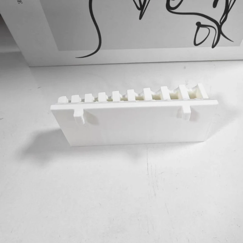 White 3D Printed Pegboard Holders Stores Wrenches And DIY Tool Efficiently