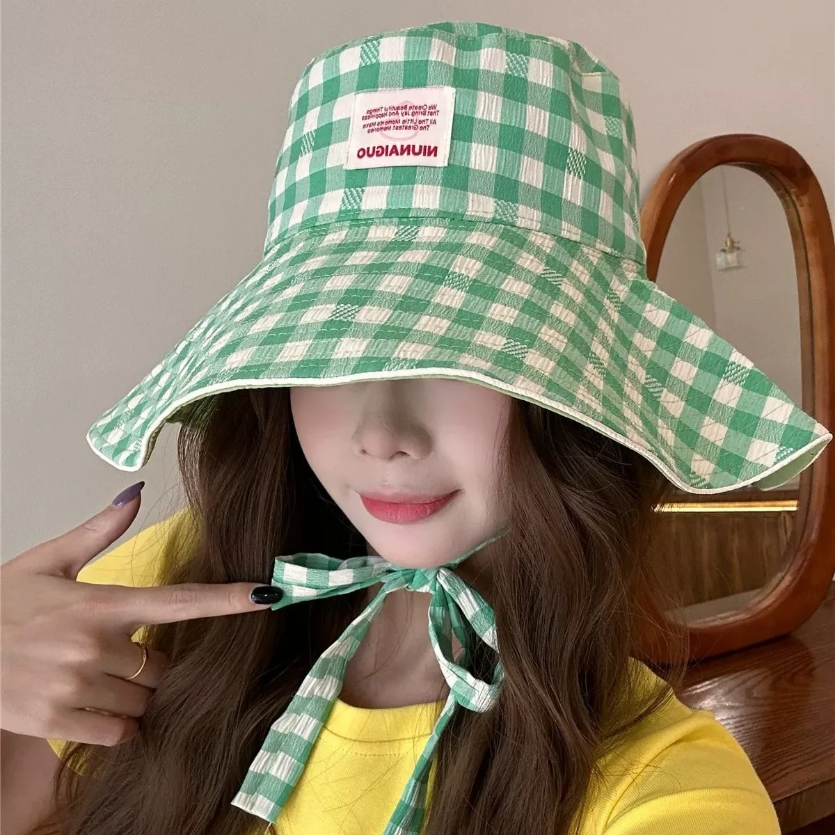 قبعة Buet ذات حافة كبيرة كاجوال منقوشة مقاومة للرياح قبعة صيفية للوجه للتخسيس قبعة واسعة للحماية من الشمس بتصميم لطيف للمهوية