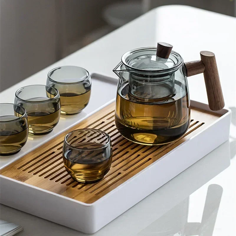 

Japanese glass teapot set Thickened heat-resistant glass Built-in filter Household daily necessities 1 pot 4 cups