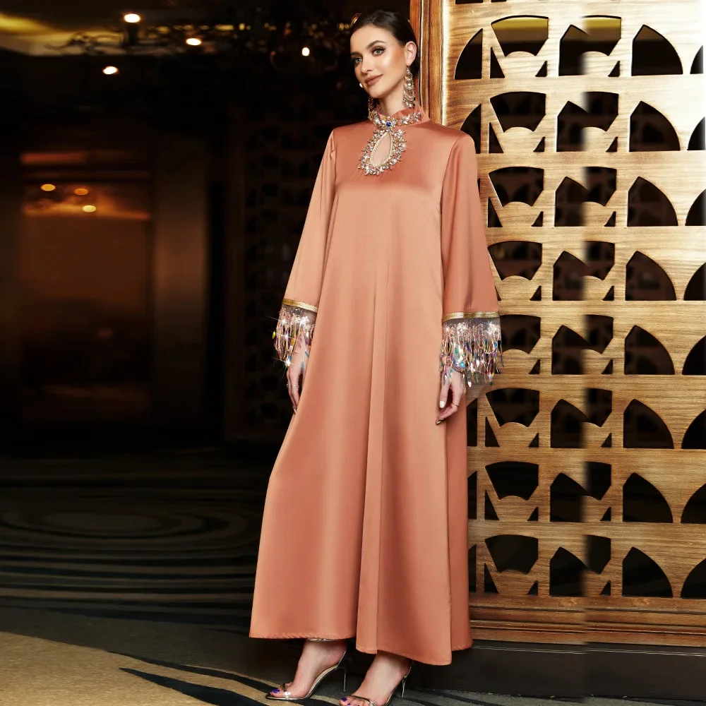 UNI Eid Muslim Woman Abaya Party Dress 2024 Hollow Out Collar Tassels Vestidos Long Sleeve Dubai Loose Abaya Ramadan Long Robe