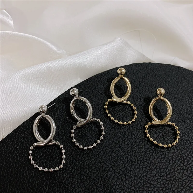 The new 8 figure circle rice bead casual earring cool handsome Harajuku trend person net red earring female tide Free shipping