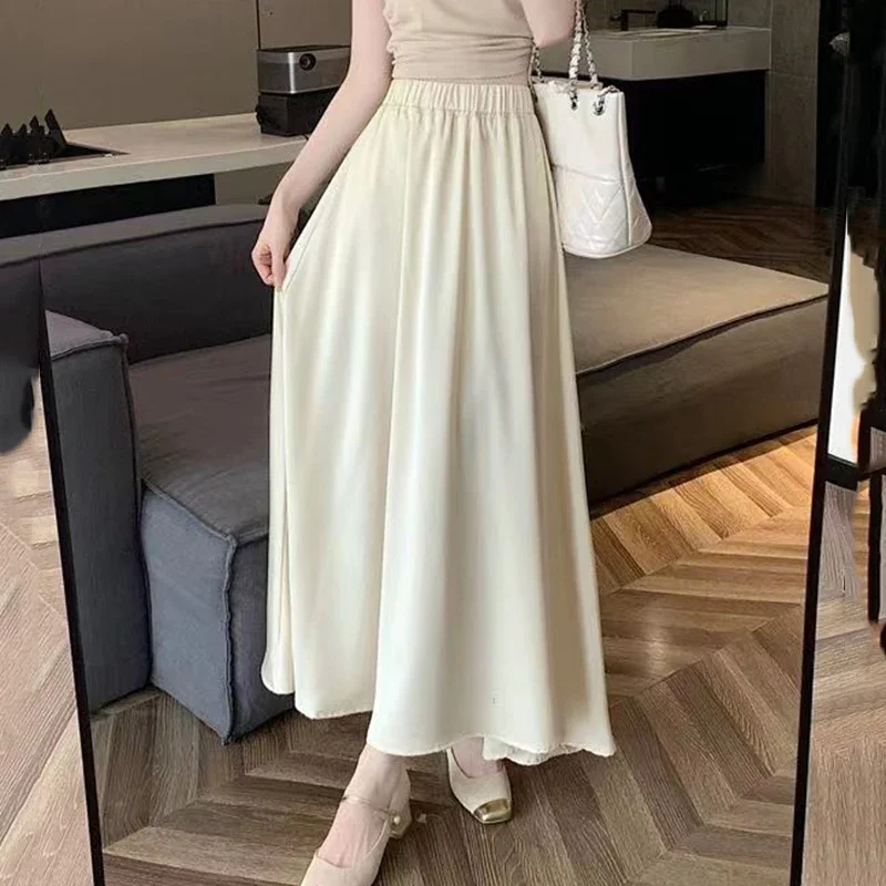 ファッションエレガントなプリーツスカートの女性 2025 新しい夏のアイスシルク固体カジュアルロングスカート女性ハイウエストすべて一致パーティースカート