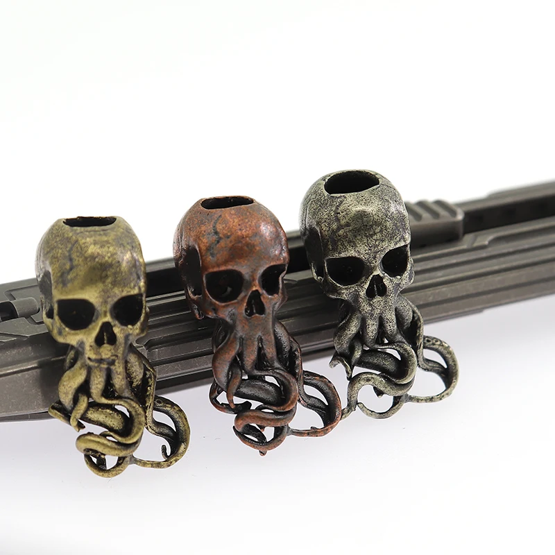 

Skull Octopus Knife Beads Creative Pendant Key Chain Umbrella Rope Pendant EDC Outdoor