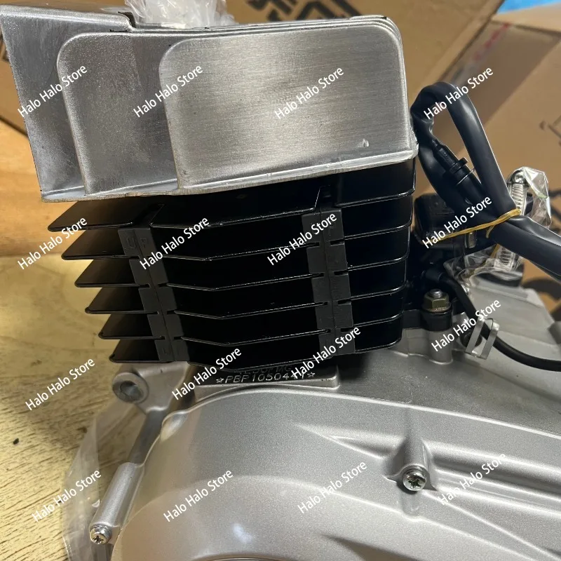 AX100 two-stroke engine