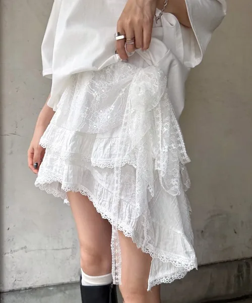 Jeans pantalons décor brodé fleur dentelle Mini jupe irrégulière voir à travers des jupes froncées taille haute Harajuku jupes plissées