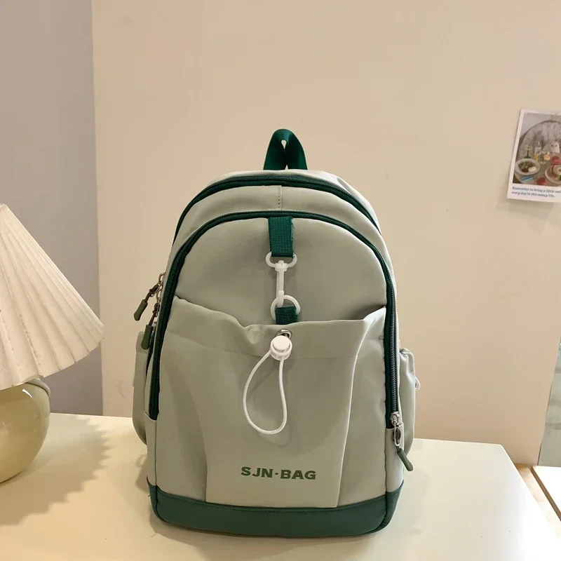 

Fashion Simple Nylon Color Matching Backpacks 2025 Hot Sale Large Capacity Casual Versatile Durable Schoolbags for Women