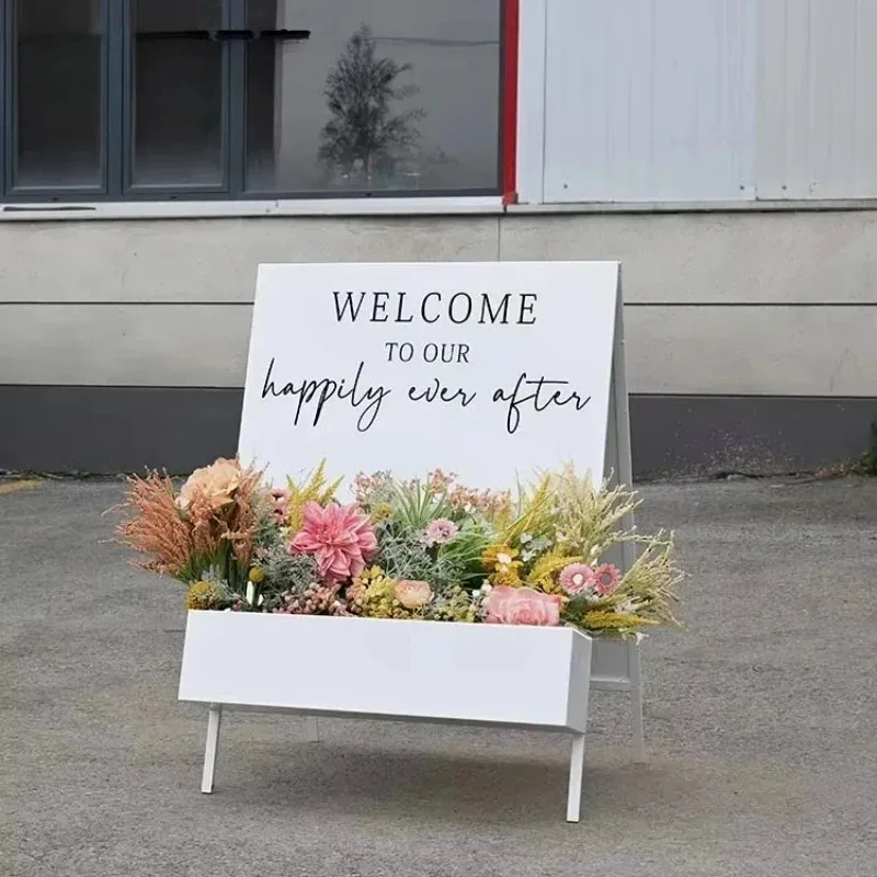 White floral box decoration with custom shelf display backdrop, used for wedding entrances