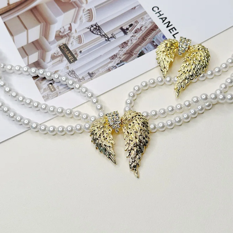European and American medieval vintage vintage plain gold wings multi-layer pearl necklace heavy industry light luxury high-end