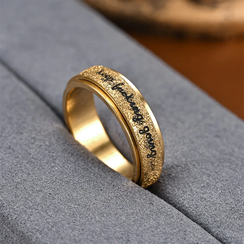 Unisex Vibrant Stainless Steel Rotating 'Keep Going' Ring Motivational Fashion Jewelry Inspirational Accessory for Daily Wear