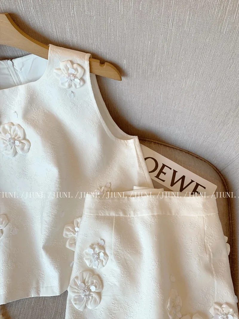 フランスの新しい小さな香りの良いツーピースセット レディース サマーファッション 3Dフラワー ノースリーブベストトップ + ミニスカート セレブリティパーティースーツ