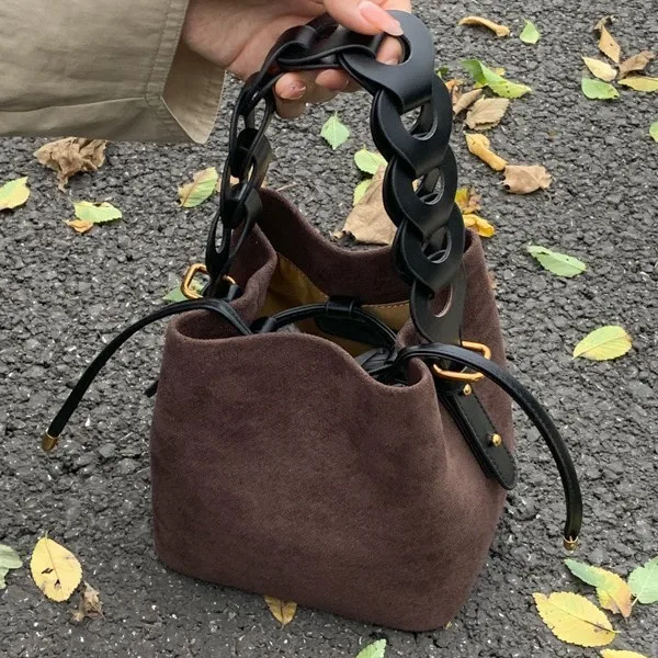 Suede woven bucket bag women's new twist portable small  versatile shoulder messenger