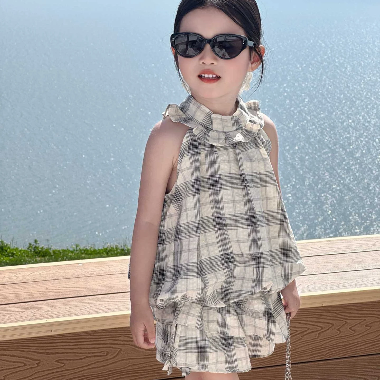 Girls Set 2026 Spring and Summer New Childrens Clothing Korean Girl Baby Check Flower Bud Vest Fart Curtain Shorts Two Sets