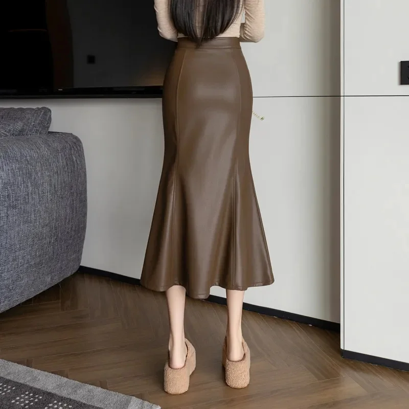 خمر عالية الخصر بولي Leather التنانير الجلدية للنساء 2026 الخريف الشتاء جديد عصري ذيل السمكة ملفوفة قلم رصاص التنانير الإناث #3