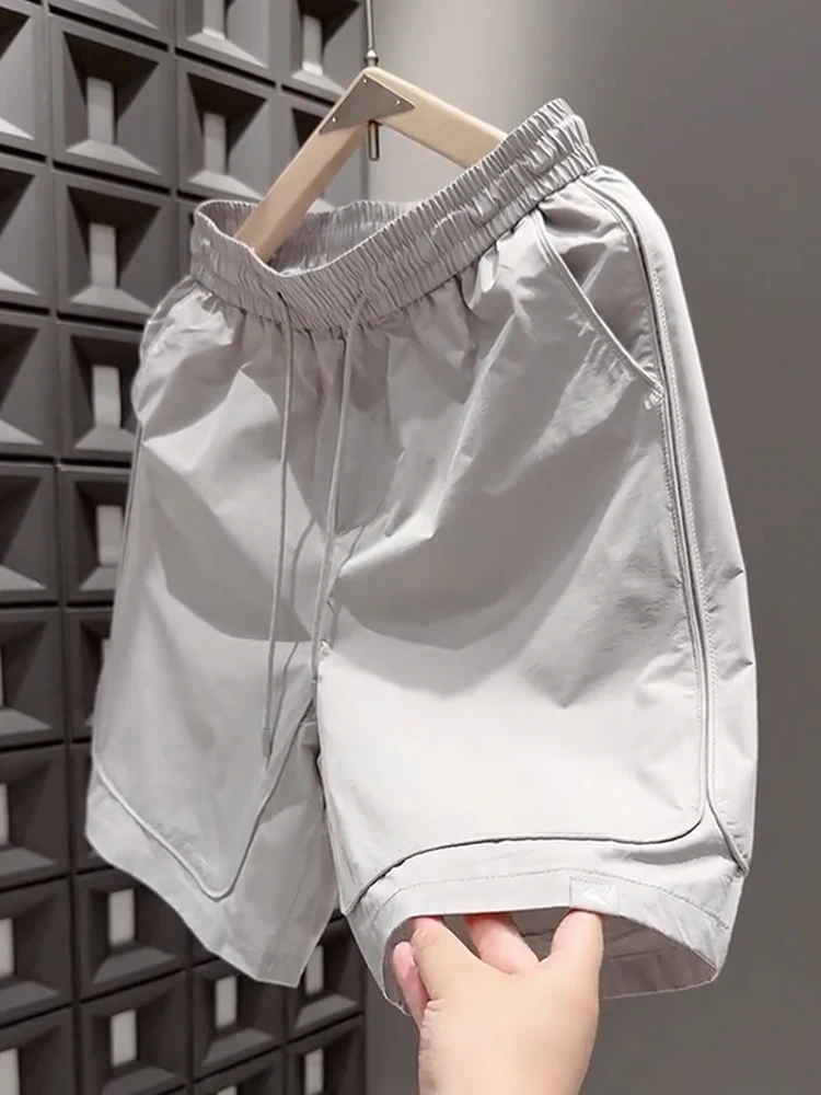 

Мужские летние повседневные брюки-шорты (пятичетверти) из полиэстера, свободного кроя, средней длины, для пляжа, трендовые, быстросохнущие, высокого качества