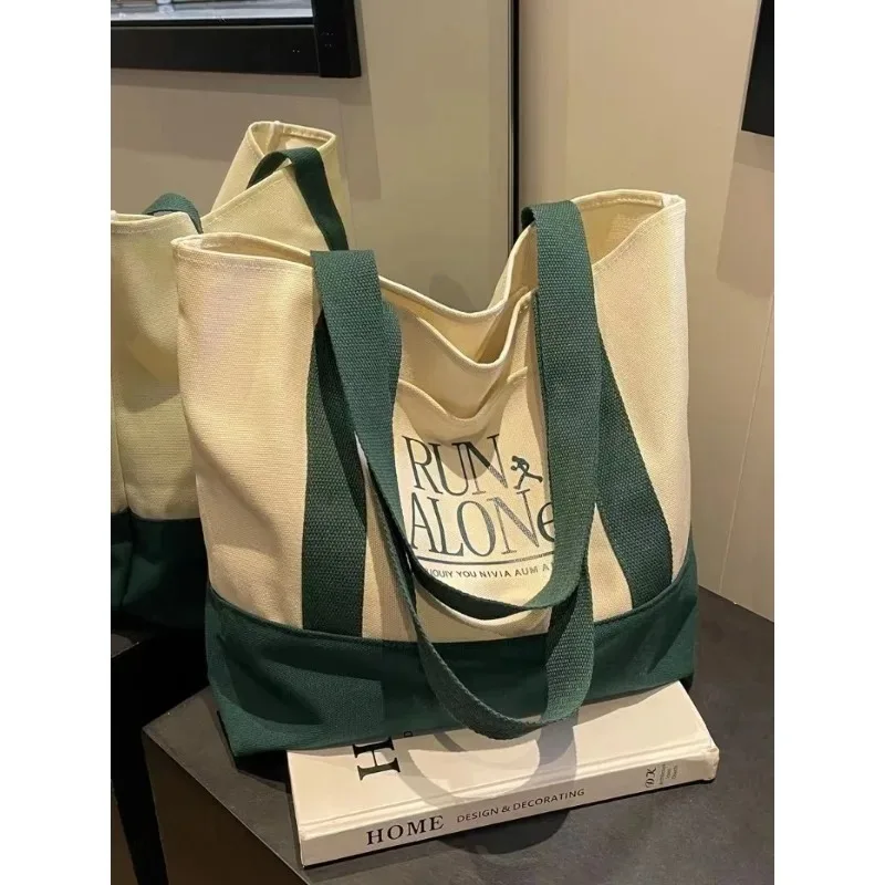 1PCSCanvas bag women's new simple and stylish large-capacity shoulder bag Joker Korean commuter handbag