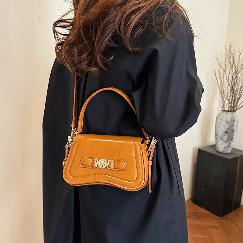

Stylish Large Capacity Diaper Bag: Elegant Crossbody Bag For Women With Luxury Designer Look And Vintage Leather Texture