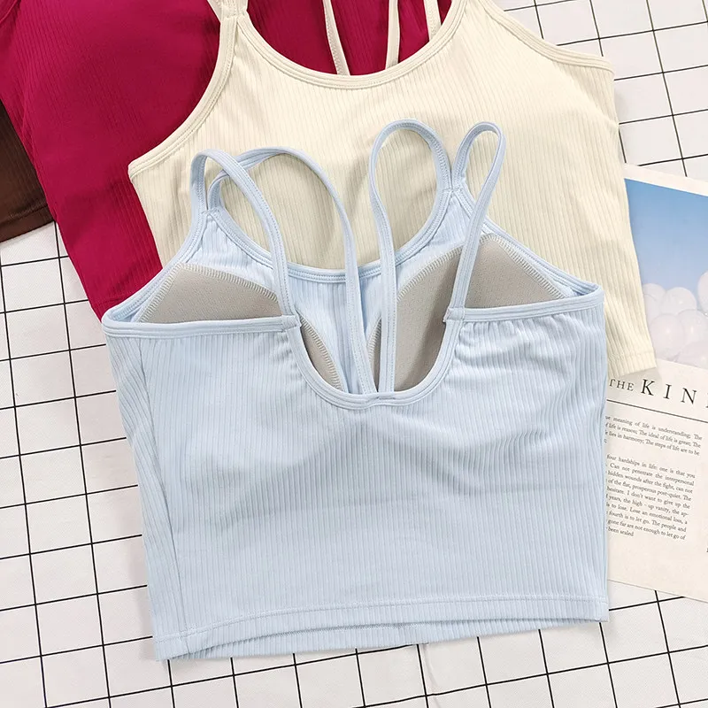 

Женский спортивный бюстгальтер в рубчик с фиксированными чашками и встроенными подушечками — противоударный, легкий для занятий йогой, пилатесом и тренировок в тренажерном зале