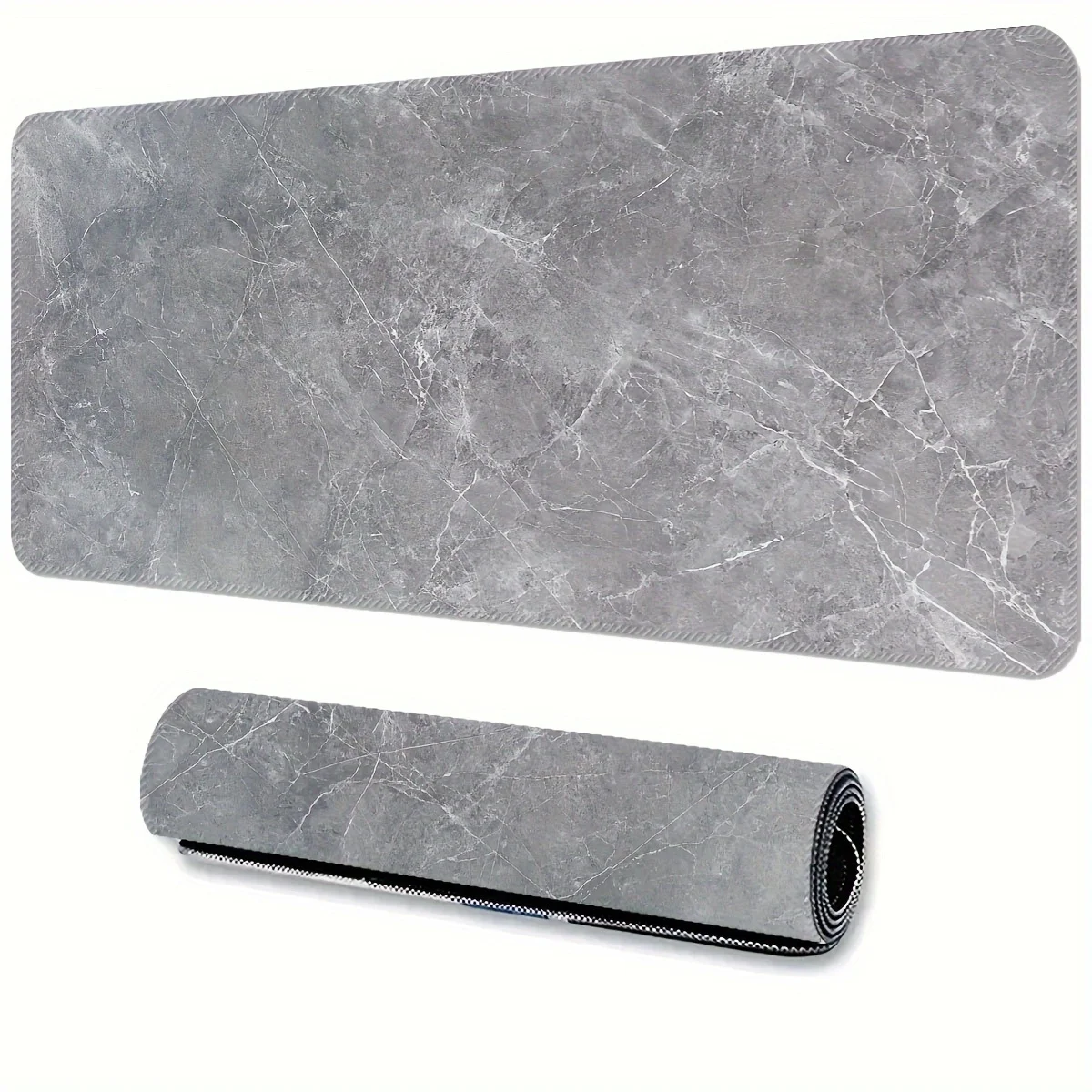 

The grey marble-textured gaming mouse pad is made of washable rubber and of high quality, suitable for gamers and families