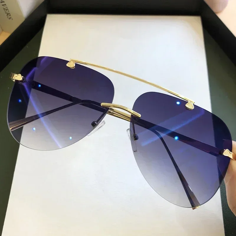 2025 gafas de sol para hombres Vintage sin montura aleación piloto de aviación marca gradiente gafas de sol mujer Metal ovalado tonos negro marrón