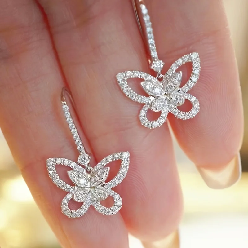 Brincos pingente de borboleta oca para mulheres, acessórios requintados de joias, espumantes, zircônia embutidos, luz francesa, moda luxuosa