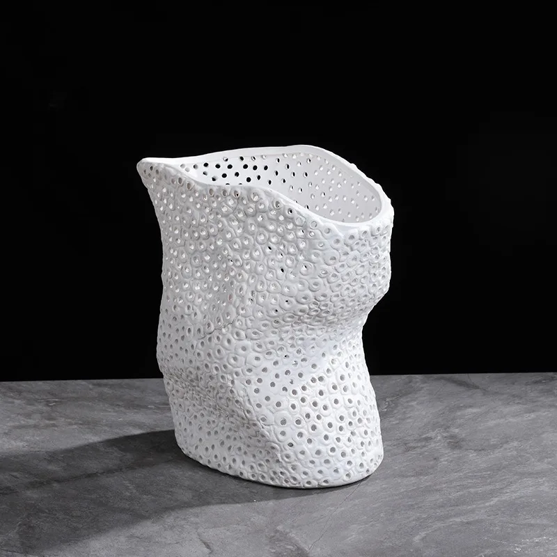 

Modern Nordic white handmade thousand-hole ceramic twister vase, minimalist sales jewelry large mouth ornament