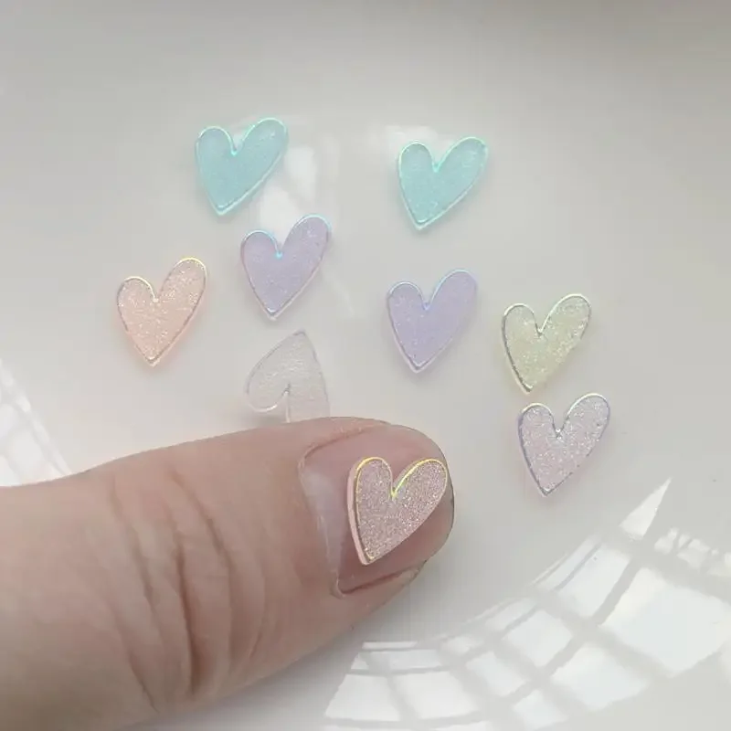 

Wholesale 2000Pcs Resin accessories Heart transparent AB color mobile phone shell material ear nail hair rope accessories 9*10mm