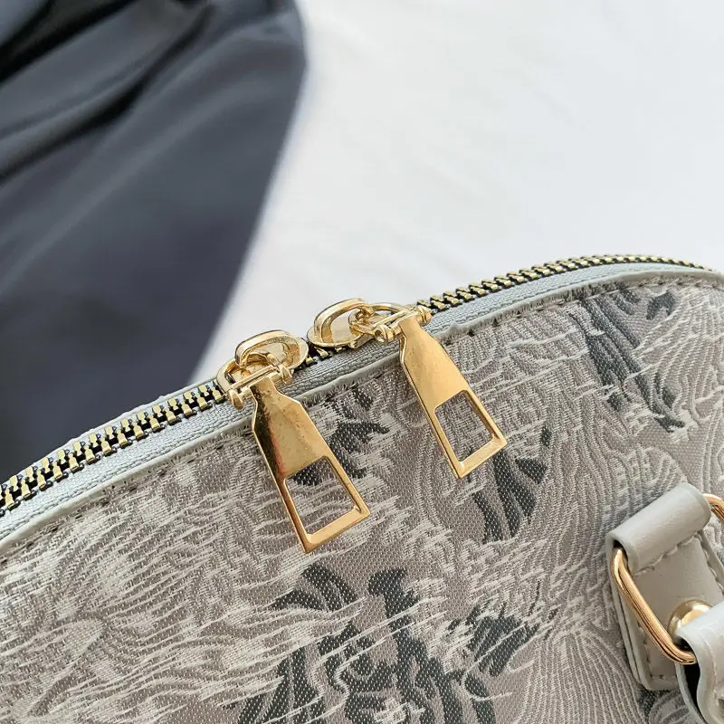 Wersja francuska niszowa popularna torebka damska nowa moda torebka z Pu koronkowa torba Crossbody wszechstronna torba z muszli wyszywana torba na