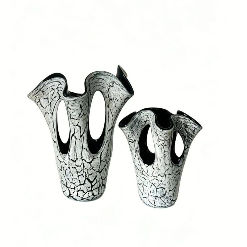 Modern simple irregular hollow fission, glazed vase