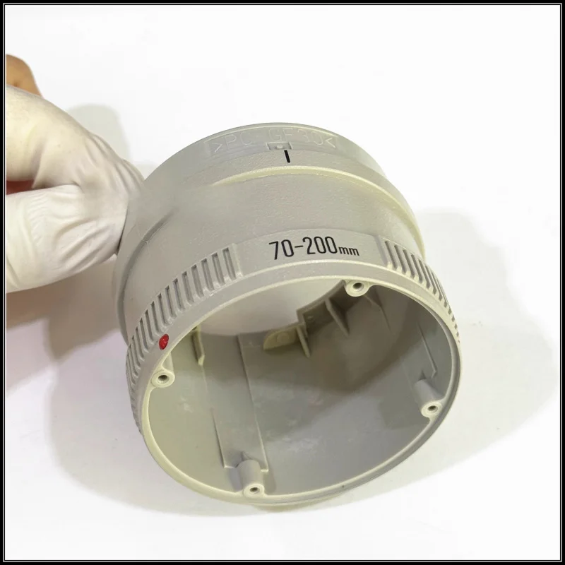 

Brand new original camera repair parts for Canon 70-200 F4IS, red dot cylinder outside the zoom bottom shell