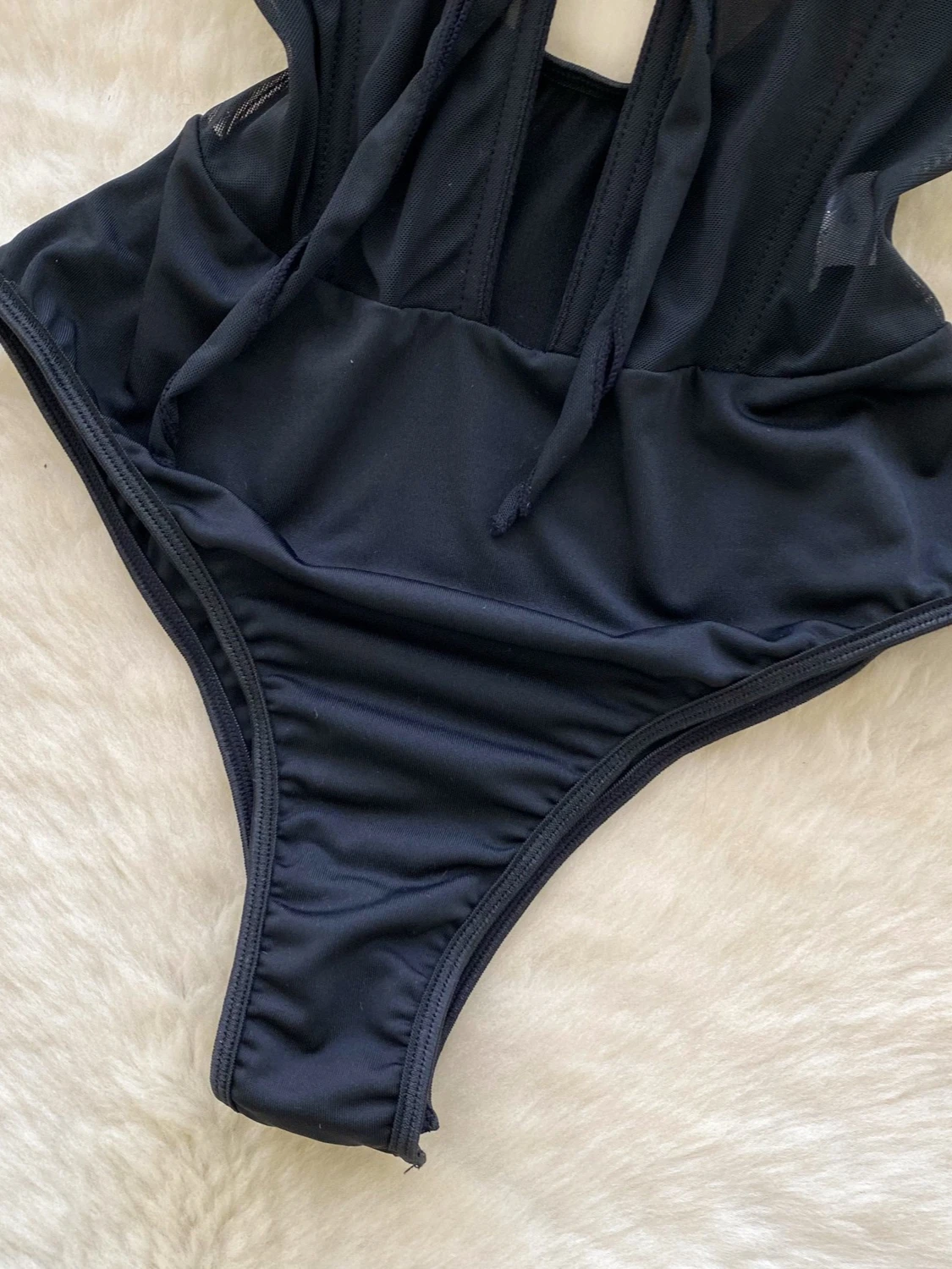 Foamlina mode croix sangle maille Body femmes Sexy noir dentelle insérer sans manches découpé mince désossé maigre Club fête corps haut