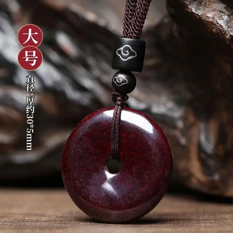 A Pendant, Made From Natural, Unrefined Ore, Featuring A In A Peace Symbol Design
