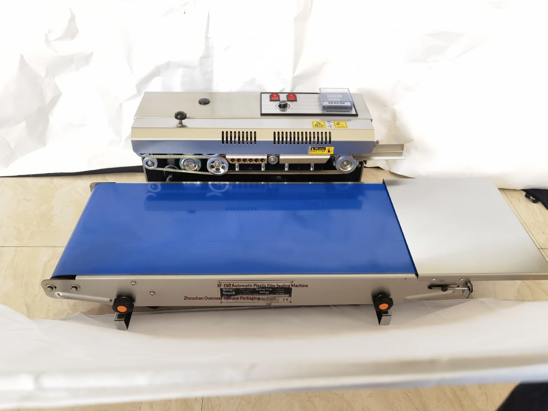 Continuous Sealing Machine Conveyor Belt Widened Huaqiao Bundle Buckle with One Year Warranty