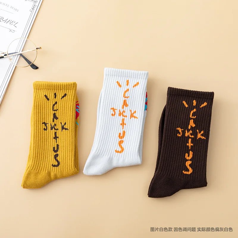 Couple color cotton socks New fashion for men and women Harajuku hip-hop skateboard Funny happy letter tube