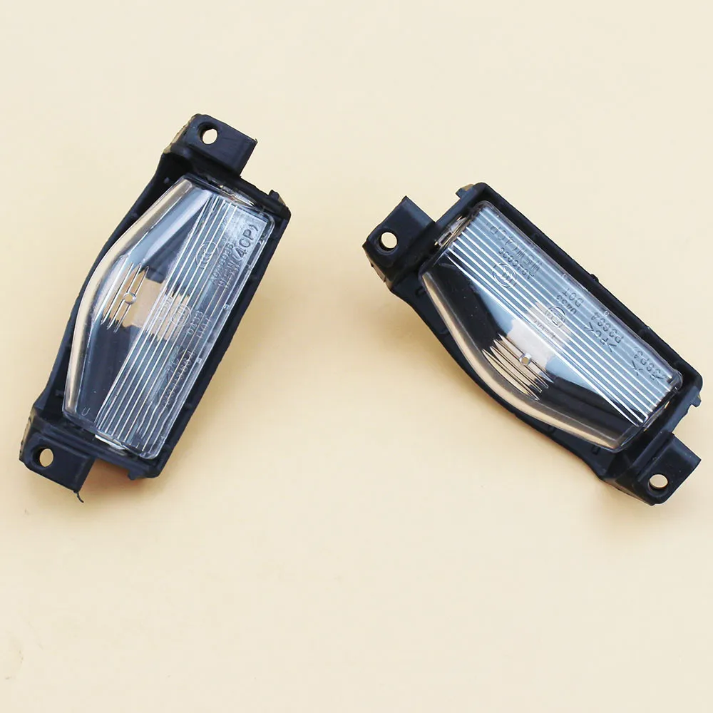 

2PCS/Lot Car Styling License Plate Lamp Light Shell Cover For Mazda 2 3 M2 M3 2011 2012 2013