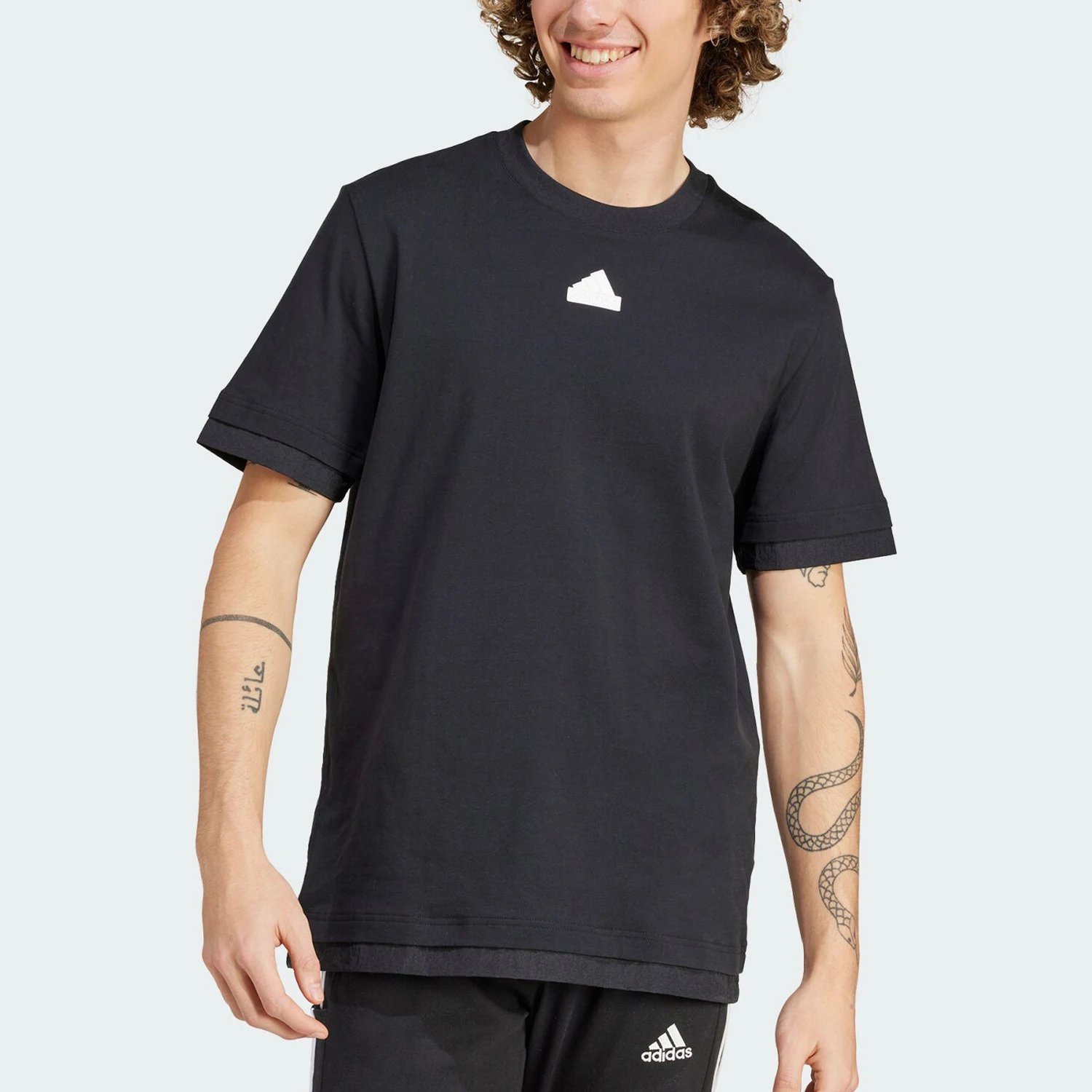 

Мужская повседневная футболка свободного кроя Adidas Genuine City Collaboration с коротким рукавом IN3711