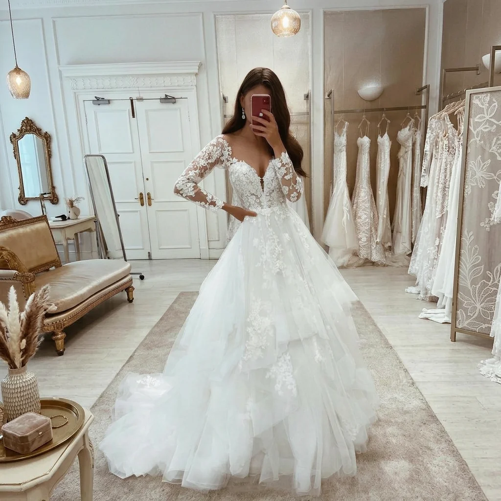 Long Sleeve V-Neck Lace A-Line Wedding Dress with Tiered Tulle Skirt and 3D Floral Appliques Bridal Gown with Train