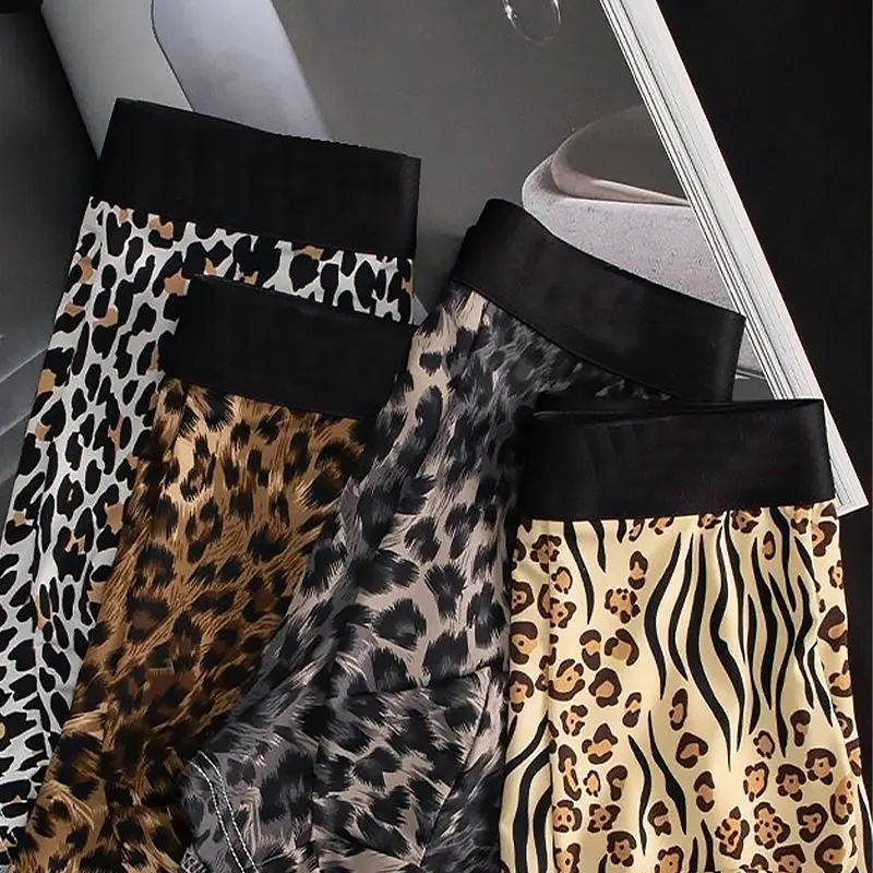 Hello Kitty Periferiche anime Cartoon Stampa leopardata Slip da ragazzo Personalità creativa Pantaloncini sexy senza traccia di seta ghiacciata Boxer carini