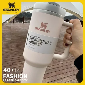 Stanley 스테인레스 스틸 이중 벽 단열 텀블러, 빨대 뚜껑 및 손잡이가 있는 여행 머그잔, 열 아이스 커피, 40oz 