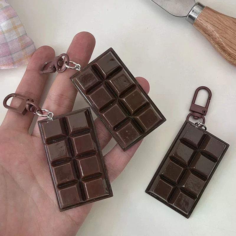 Pendentif de téléphone de sac unique ; Porte-clés de nourriture au chocolat délicieux simulé ; Porte-clés emblème idéal pour cadeau d'affaires
