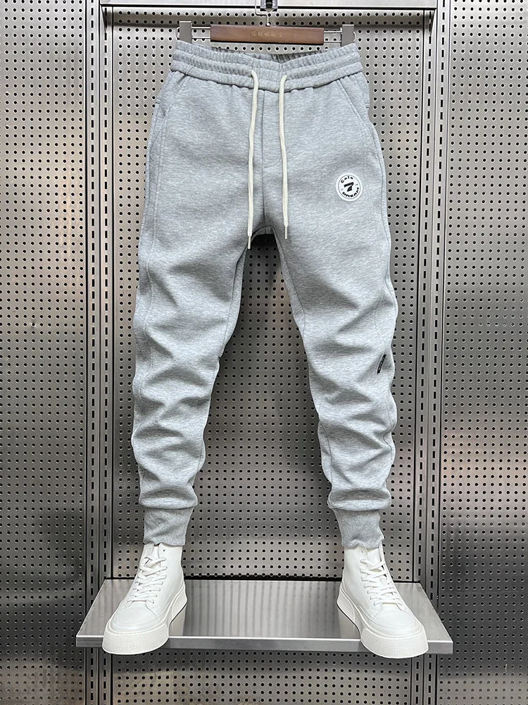 

Новинка 2024, повседневные брюки на подкладке, мужские осенне-зимние свободные спортивные штаны из девяти предметов с манжетами, модные молодежные брюки