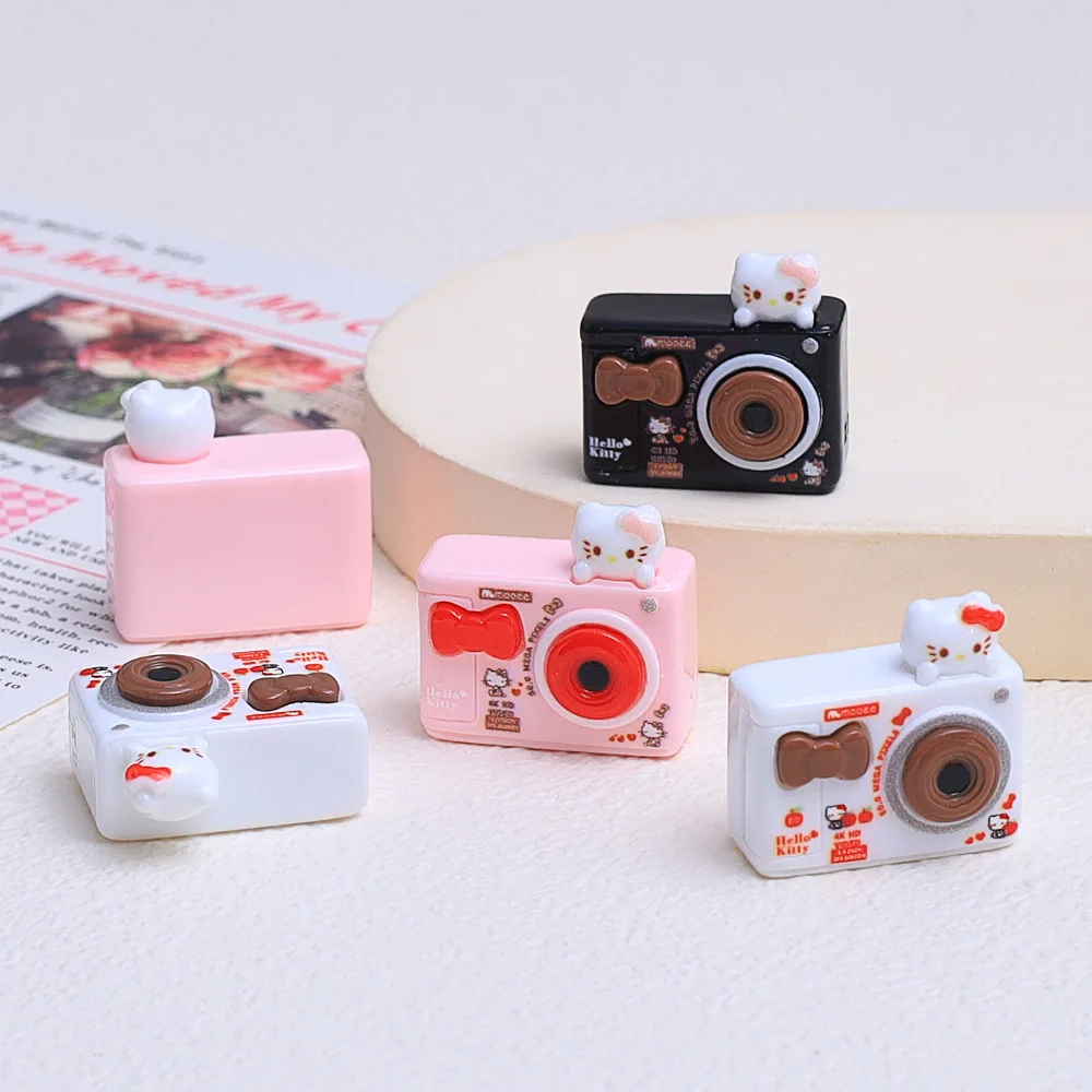 2 ชิ้น 3d Hello Kitty Series สีดํากล้อง DIY เรซิ่นอุปกรณ์เสริมเครื่องประดับ Hairpin โทรศัพท์มือถือกรณี Charm พวงกุญแจจี้วัสดุ