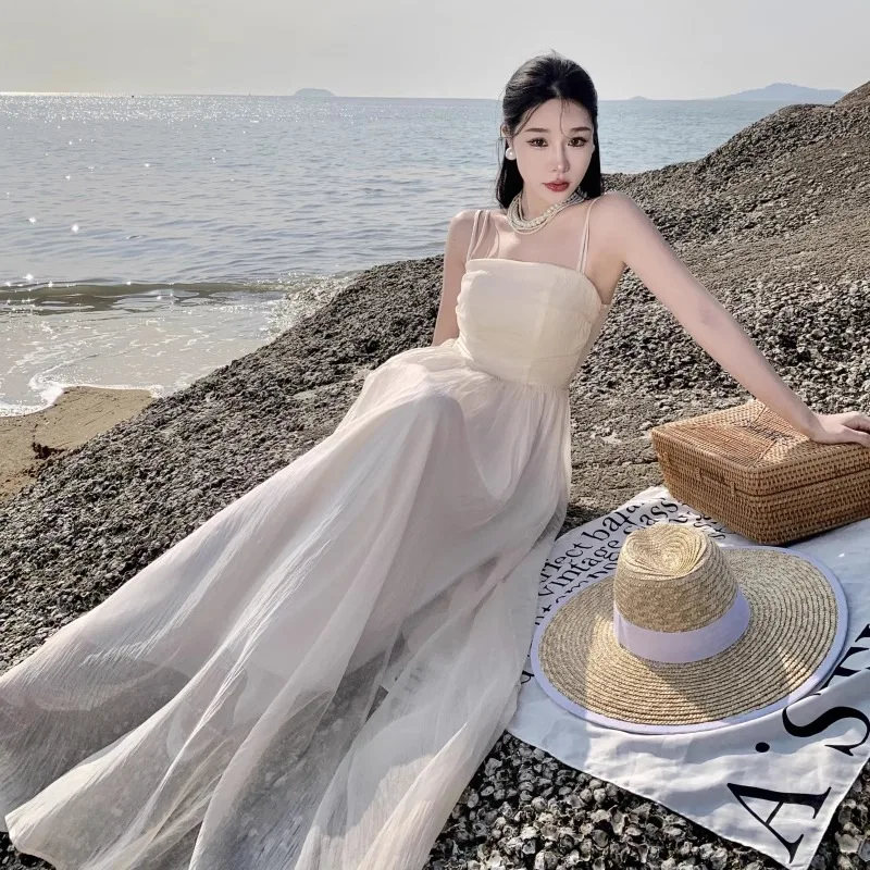 Tea Break French Style Seaside Vacation Sling Dress Women's Summer Fairy Temperamental High-Grade Sanya Beach Long Skirt