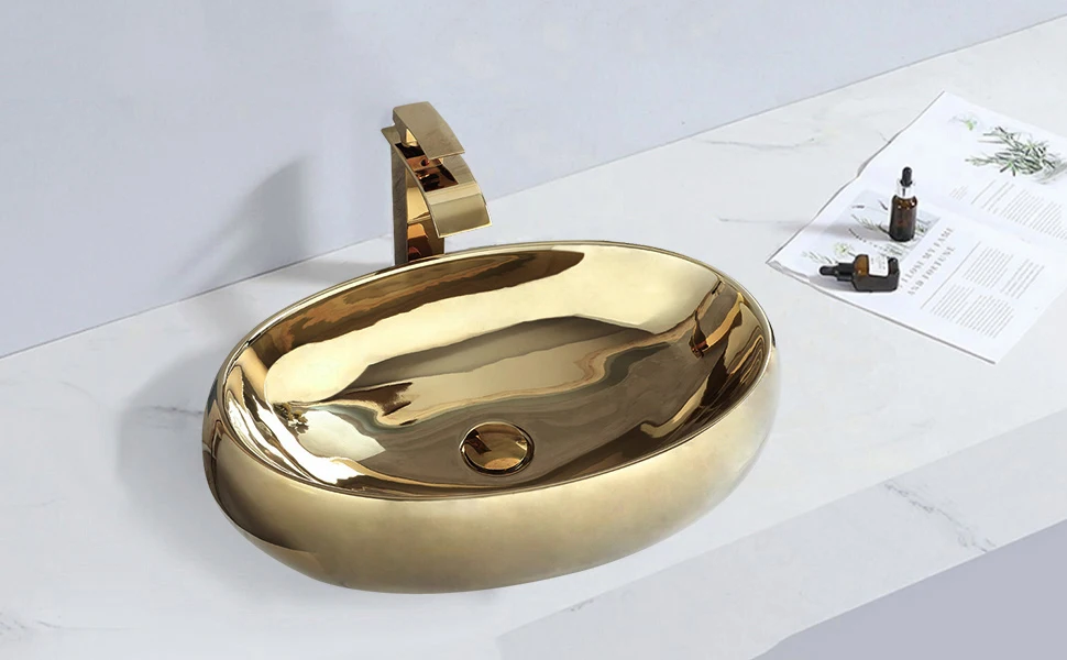 ZAPPO 23 Inch Bathroom Vessel Sink Gold Ceramic Sink Bowl Above Counter Oval Bathroom Sink with Waterfall Faucet Drain Combo