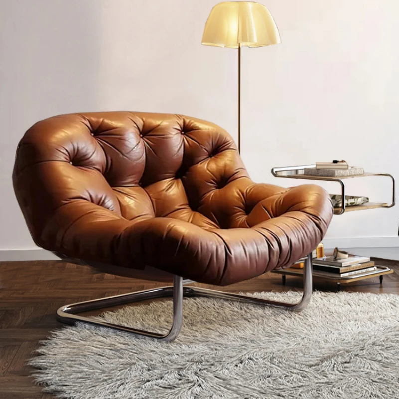 

Antique Italian style lounge chair with genuine leather on the first floor.