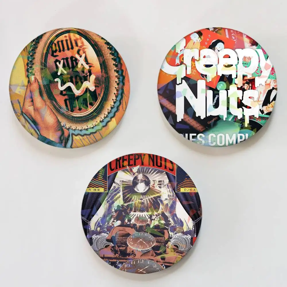 Jap Band C-CrEepY-Y N-nuts Badges Round Laser Badge Brooch Backpack Accessories