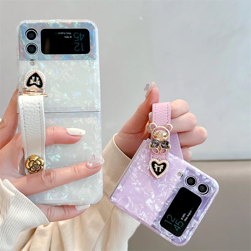 Custodia per telefono con cinturino in orso con strass carino per Samsung Galaxy Z Flip 5 4 3 Z Flip3 Flip5 Flip4 5G Cover Kawaii Conch Shell