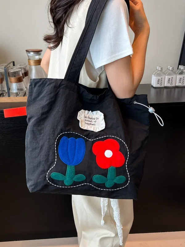 2025 nuevo bolso de hombro de flores de verano de gran capacidad Edición coreana lindo bolso de mano de ocio bolso de compras de gran capacidad bolso de lona